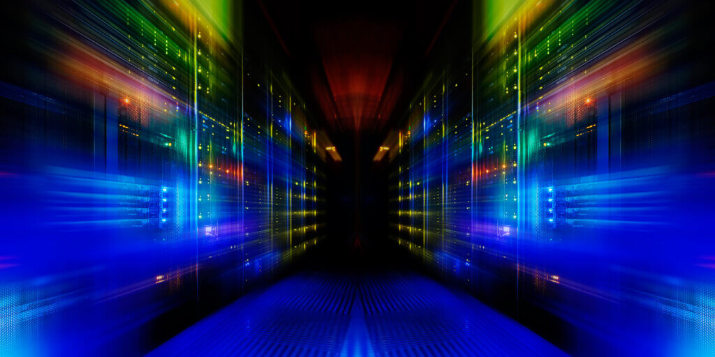 Professional Services 1 A colorful, futuristic representation of data storage with vibrant lights illuminating server racks, creating a dynamic, digital atmosphere.