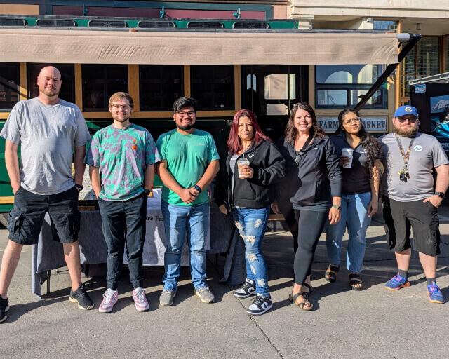 Community Impact 10 Core Scientific team poses for a photo after volunteering